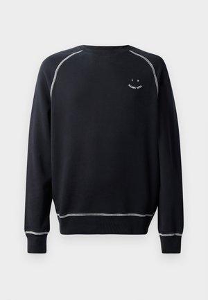 Sweatshirt noir avec un col rond, des manches longues et des coutures blanches contrastantes. Présente un petit motif sur la poitrine. Texture en tissu douce.