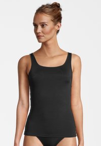 Black tank top with a square neckline and thin straps. Made from smooth, stretchy fabric, featuring a fitted design for comfort.