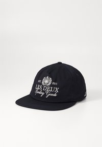 Navy blue cap made of cotton with a structured design. Features embroidered text "LES DEUX Sporting Goods" and a logo on the front.