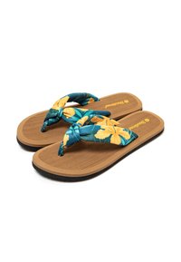 Chanclas con tiras de tela que presentan un fondo azul y un patrón floral amarillo. La suela es marrón con una textura de grano de madera y base de goma negra.