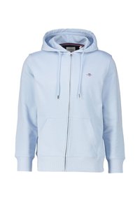 Svetlo modrá mikina na zips s kapucňou na šnúrku, predným vreckom a vyšívaným logom. Vyrobená z mäkkej tkaniny s rebrovanými manžetami a lemom.
