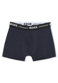 Námornícke spodné prádlo s čiernym elastickým pásom, na ktorom sa nachádza biele logo "BOSS". Hladký materiál, priliehavý strih s predným vreckom a prešitými švami.
