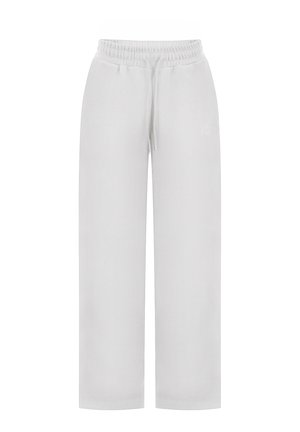 Białe, szerokie spodnie dresowe z elastycznym pasem i sznurkiem, z subtelnym logo w tonacji na lewej udzie.