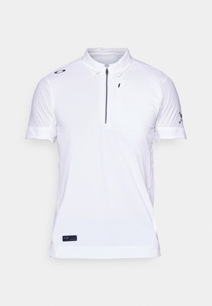 White short-sleeve polo shirt with a zippered neck, made from smooth fabric, featuring a logo on the left shoulder and accents on sleeves.