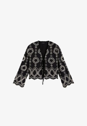 Giacca nera a maniche lunghe con apertura frontale, ricamata con motivi floreali e geometrici bianchi e orlo smerlato, legata sul davanti con un laccio nero.