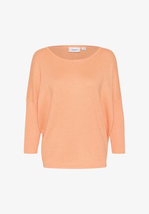 Light peach knit pullover with a wide neckline, three-quarter sleeves, and ribbed texture. Tag reads “Saint,” size medium.