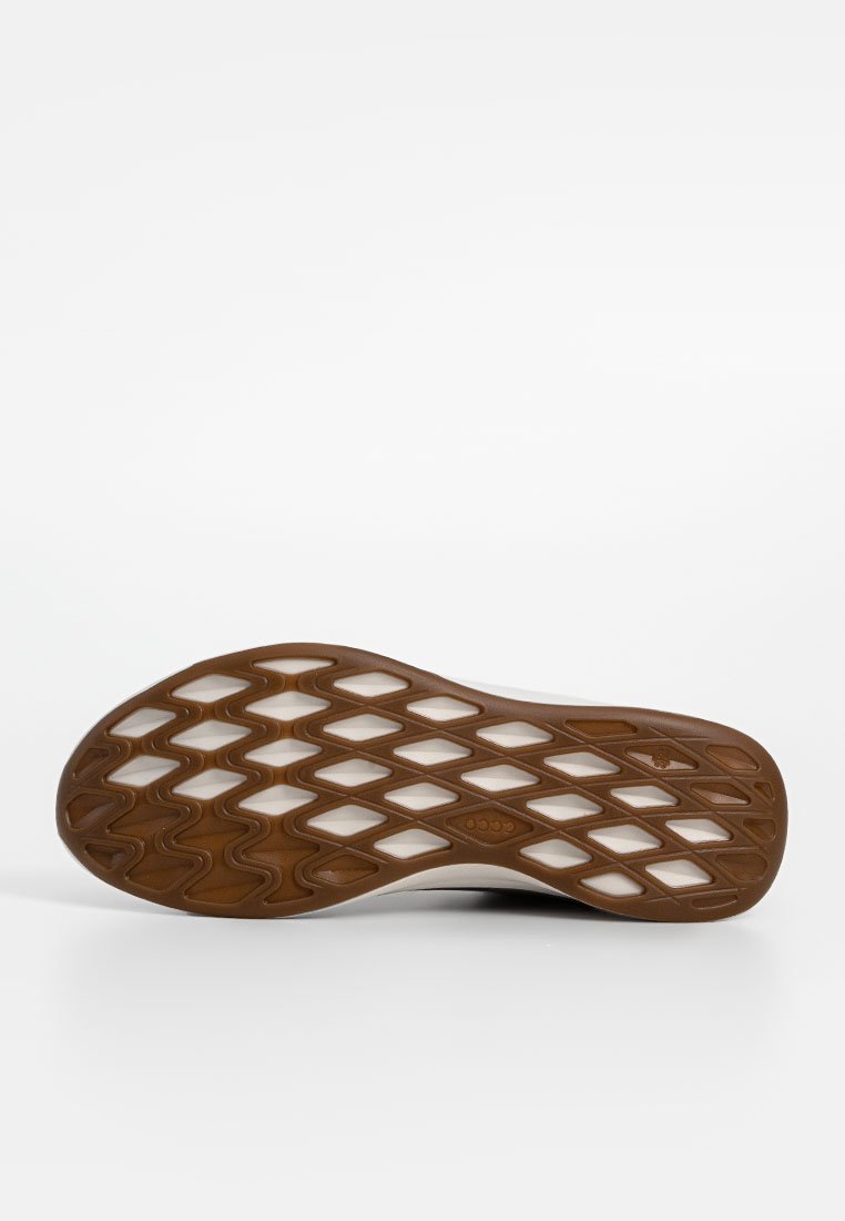 Schuhsohle mit flexiblem Design, ausgestattet mit einer gummierten Laufsohle in Brauntönen mit diamantförmigem Muster und einer weißen Zwischensohle. Strukturiert für besseren Halt.