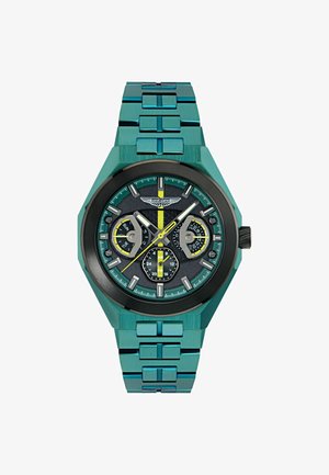 Ceas metalic albastru-verzui cu carcasă octogonală, cadran negru, accente galbene și albe, trei sub-cadrane și o brățară metalică integrată.