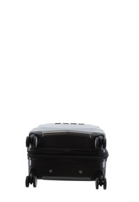 Black hardshell suitcase with a rectangular shape, features four swivel wheels, a zip closure, and embossed brand logo on the top.
