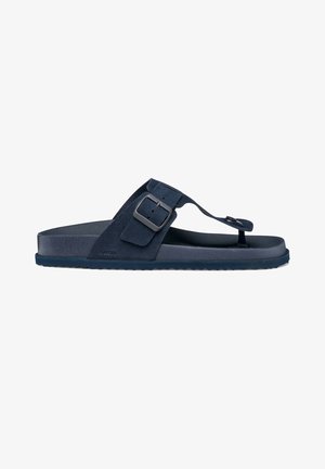 Infradito in camoscio blu navy con cinturino regolabile con fibbia e suola imbottita, progettata per un uso casual.