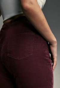 Next HOURGLASS FLARED - Housut - berry red