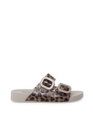 Slip-on sandal with beige sole, leopard print straps, and two large adjustable beige buckles on top.