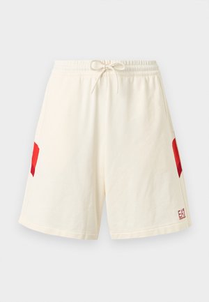 Krémové šortky se stahovací šňůrkou, s červenými geometrickými postranními akcenty a malým červeným logem EA7 Emporio Armani na spodní levé noze.