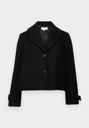 Juoda trumpa striukė su įpjovimu apykakle, dviem priekiniais mygtukais ir mygtukais užsegamais rankovėmis. Pagaminta iš lygaus audinio.