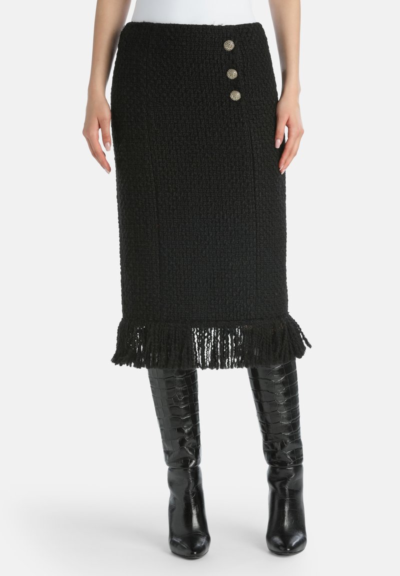 Black, knitted midi skirt with a fringed hem and three decorative buttons on the front. Textured fabric enhances visual interest.