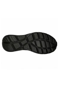 Suela de zapato de goma negra con patrones texturizados, que presenta indentaciones hexagonales y rectangulares para tracción y estabilidad.
