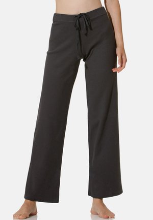 Pantalons noirs, légers, à coupe décontractée avec une taille élastique à cordon, présentant un design à jambes larges et une texture de tissu lisse.