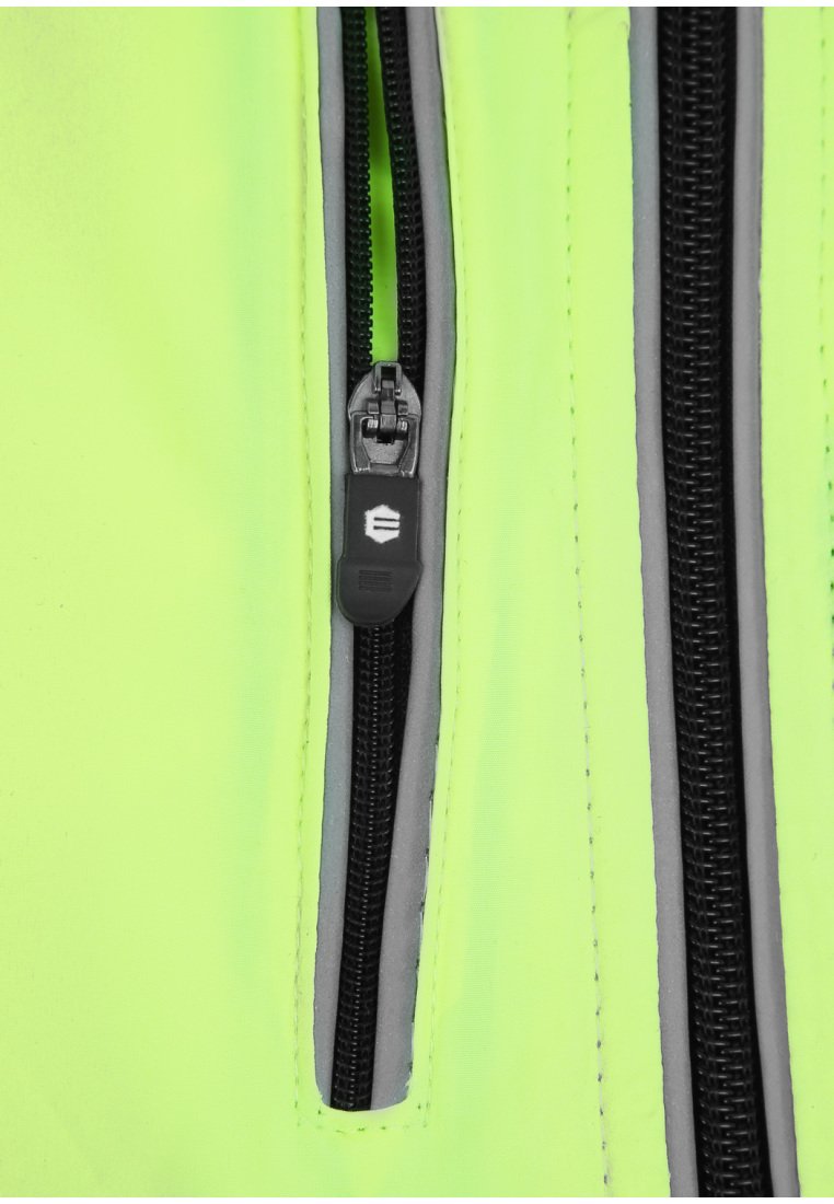 Leuchtend gelber Stoff mit schwarzen und grauen Reißverschlussdetails. Zwei Reißverschlüsse haben ein elegantes Design, das sowohl die Funktionalität als auch die ästhetische Anziehungskraft erhöht.