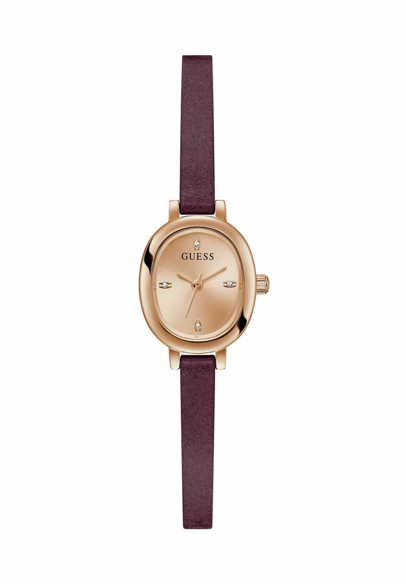 Montre-bracelet dorée avec un boîtier ovale, un cadran crème, huit marqueurs numériques et un bracelet en cuir bordeaux. Mouvement à quartz.