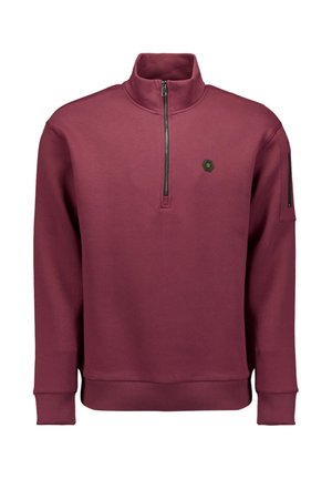 Bordeauxrode fleece trui met een hoge kraag, halve rits aan de voorkant en een ritssluiting op de mouwzak. Voorzien van een zeshoekig logo op de borst.
