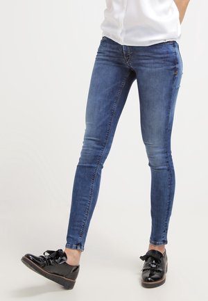 Vaqueros pitillo - stone blue denim
