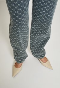 Minus SIENNE HIGH WAIST  - Široke kavbojke - light denim