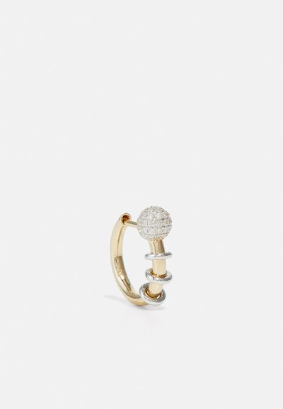 Gold and silver ring featuring a spherical top embedded with clear crystals, smooth surface, and interlocking circular accents.