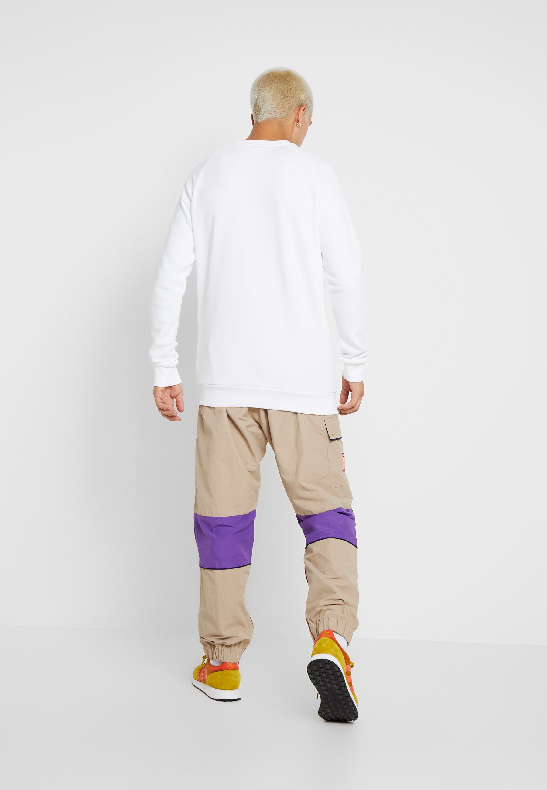 beige adidas track pants