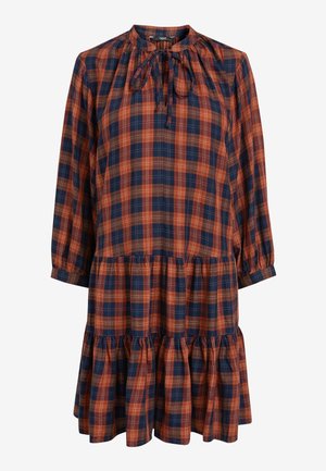 Robe à manches longues, à volants, avec un motif à carreaux bleu marine et orange rouille et un lien au niveau de l'encolure froncée.