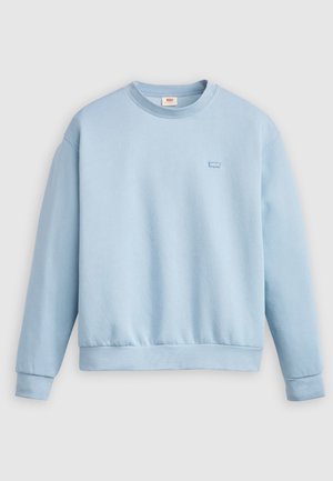 Sweatshirt bleu clair, col rond, manches longues, poignets et ourlet côtelés, texture douce, petit logo sur la poitrine gauche.