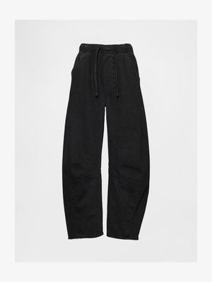 Black, wide-leg pants made of denim, featuring an elastic waistband with drawstring, side pockets, and knee panel details.