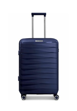Dark blue hard-shell suitcase with horizontal ridges, four wheels, and an extended silver telescopic handle.