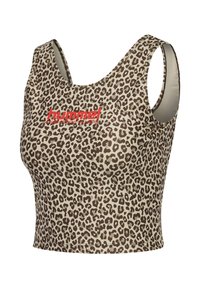 Crop top de sport à imprimé léopard avec un col arrondi, de larges bretelles et un logo rouge « hummel ». Confectionné en tissu lisse et extensible.