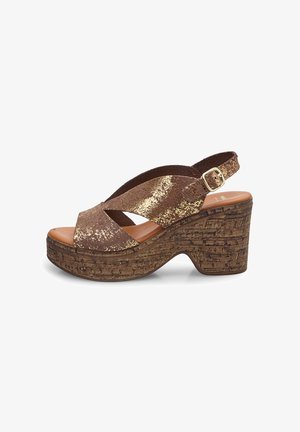 Brown slingback platform sandal featuring a textured cork wedge heel and gold glitter accents on the cross straps. Soft inner sole.