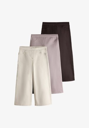 Tre nederdele til knæene i creme, mauve og mørkebrun, hver med forlommer og elastiske taljebånd.