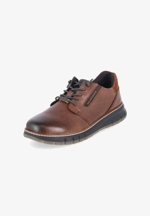Bruine leren casual veterboot met zwarte gevoerde kraag en zwarte rubberen zool, met merknaam "Salamander" op het zijpaneel.