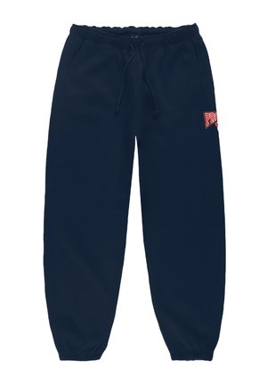 Granatowe dresy wykonane z miękkiego materiału, z elastycznym paskiem w talii, regulowanym sznurkiem i czerwonym logo na lewej stronie biodra. Nogawki wykończone ściągaczem.