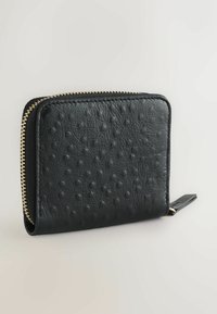 Black leather wallet featuring a textured surface with raised dots, a gold zipper closure, and a compact rectangular shape.