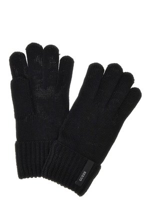 Paire de gants noirs tricotés avec poignets côtelés, comportant une petite étiquette noire avec le mot GUESS sur un poignet.
