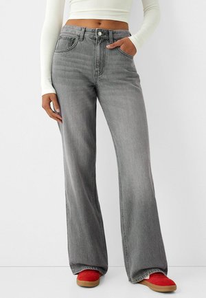 Flared Jeans - mottled dark grey