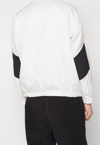 Nike Sportswear Träningsjacka - off-white