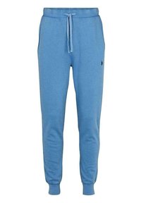Light blue jogger pants with elastic cuffs, drawstring waist, side pockets, and small embroidered logo on the upper thigh.