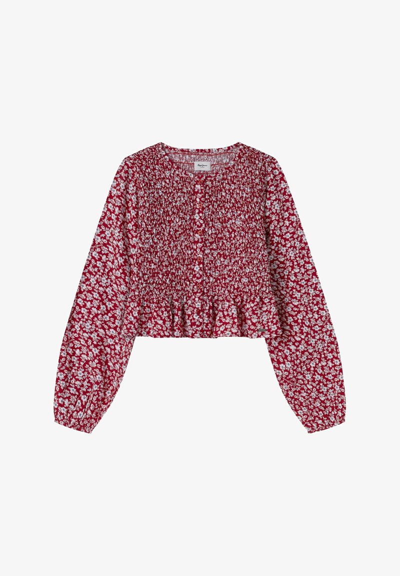 Sarkana ziedu blūze ar garām piedurknēm, savirknētu tekstūru, apaļu kakla izgriezumu un pepluma apdari, ar baltu ziedu rakstu visā vārdā.