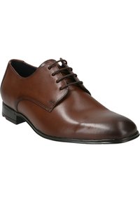 Chaussure oxford en cuir marron avec une finition lisse, un bout rond et un design à lacets. Présente un petit talon et un détail de surpiqûre subtil.