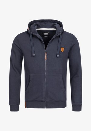 Sudadera con cremallera azul marino hecha de tela suave, con capucha, dos bolsillos frontales y un parche de cuero con el logo en el pecho. Puños y dobladillo acanalados.