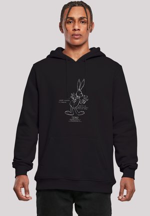 Svart hettegenser med Bugs Bunny-grafikk i hvit kontur, med tekstdetaljer. Avslappet passform, frontlomma og snorhette.