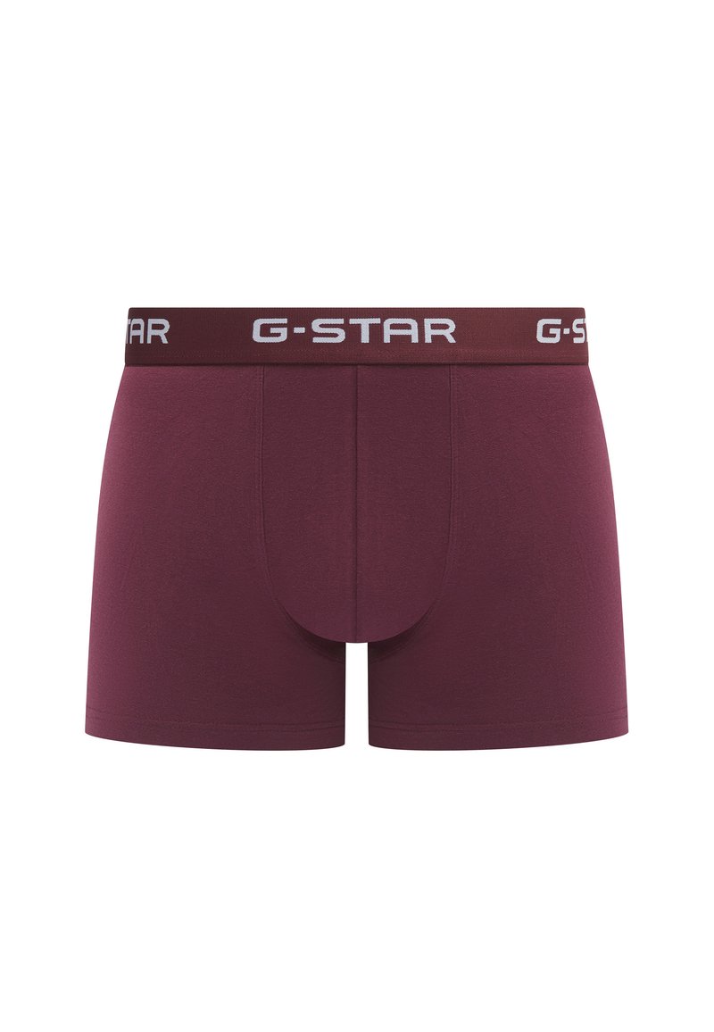 Bordeauxrote Boxer-Briefs mit einem G-Star-Logo auf dem elastischen Bund. Aus weicher Baumwolle gefertigt, mit einer enganliegenden Passform und einer Fronttasche.