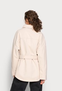 Gina Tricot Pitkä takki - off-white