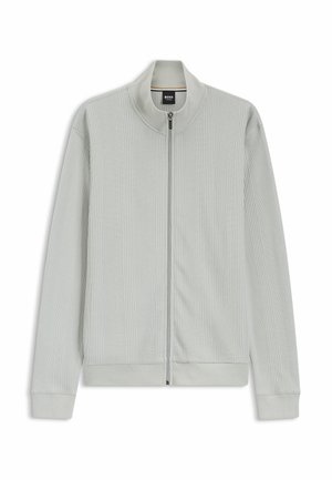 Pull à fermeture éclair gris clair avec motif en maille verticale texturée, manches longues, col montant et poignets et ourlet côtelés.