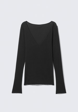Zwart lange mouwen top met diepe V-hals aan de achterkant, rechte zoom en licht uitlopende manchetten, getoond op een effen lichte achtergrond.